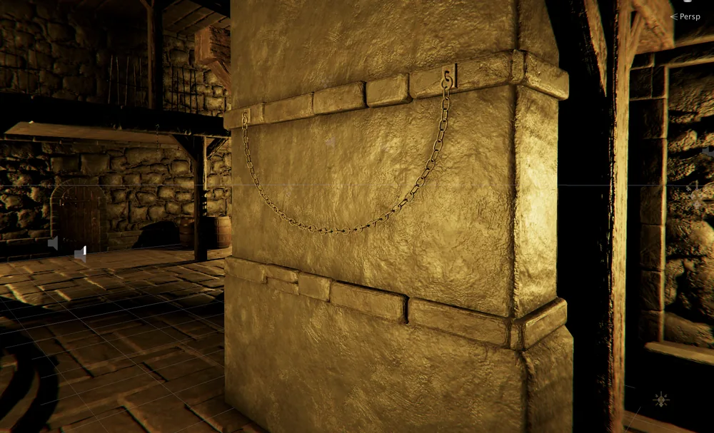 Dungeon 2 interior with a tall rectangular stone pillar and chains hanging on the wall